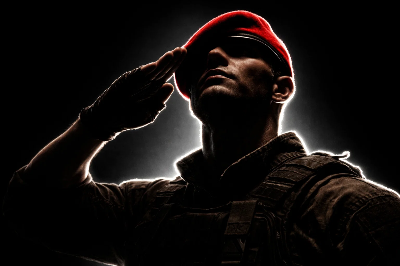 Soldier with red beret looking proudly to the sky
