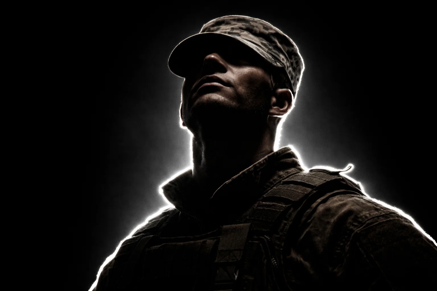 Soldier with army hat looking proudly to the sky